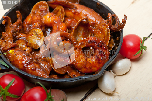 Image of fresh seafoos stew on an iron skillet