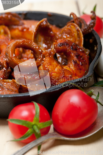 Image of fresh seafoos stew on an iron skillet