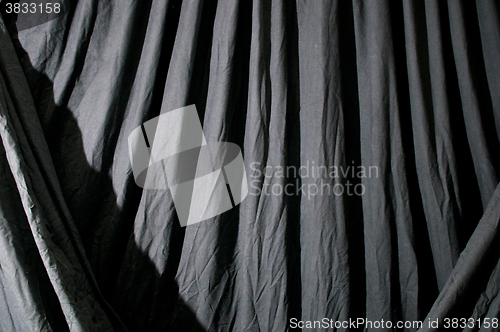 Image of Draped black background cloth