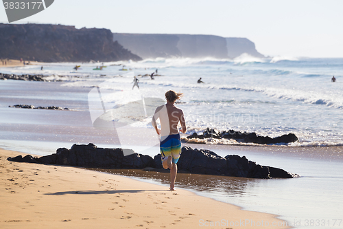 Image of Active people on El Cotillo beach, Fuerteventura, Canary Islands, Spain.