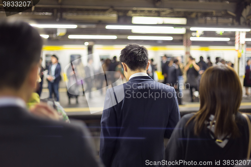 Image of Passengers traveling by Tokyo metro.