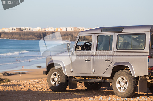 Image of Jeep on beach.