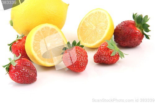 Image of two lemons and berries