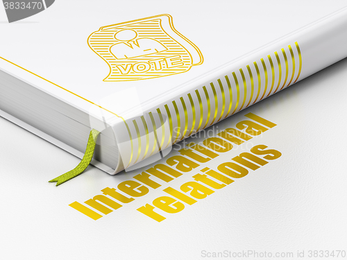 Image of Politics concept: book Ballot, International Relations on white background