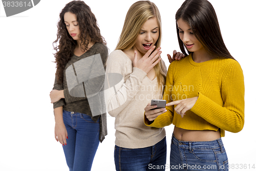 Image of Teenage girls gossiping