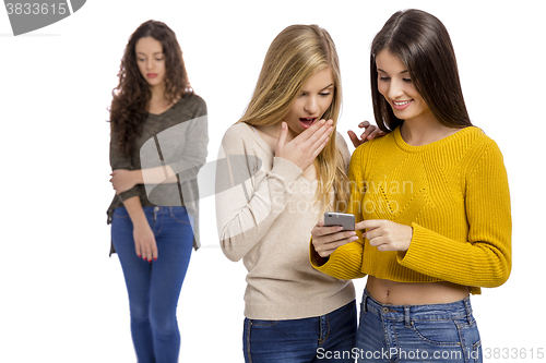 Image of Teenage girls gossiping