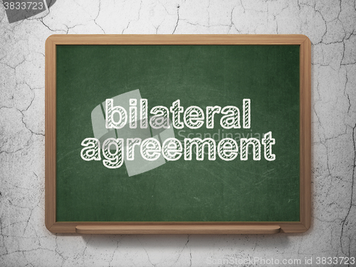 Image of Insurance concept: Bilateral Agreement on chalkboard background