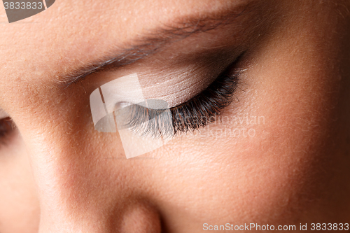 Image of Female eye with long eyelashes