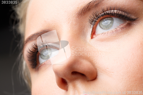 Image of Female eye with long eyelashes