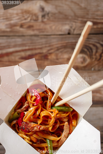 Image of Asian noodles with fresh green onion and boiled egg