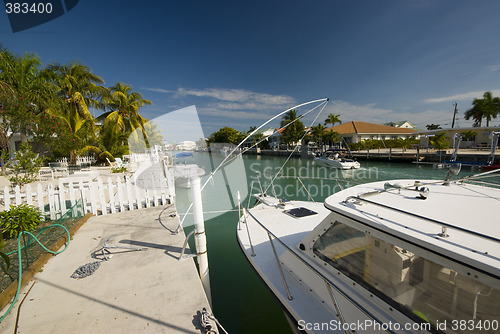 Image of canal with boats and homes florida keys