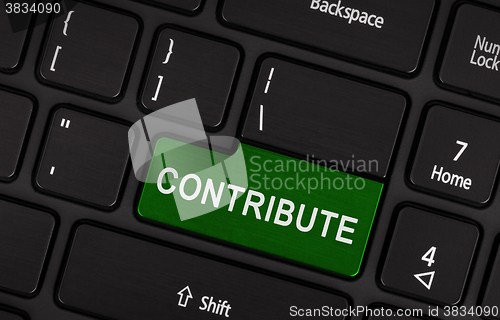 Image of Laptop keyboard - Contribute (green key)