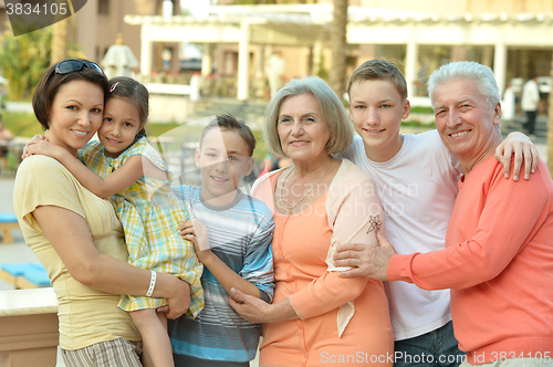 Image of Family relaxing at resort