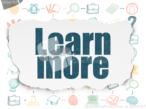 Image of Education concept: Learn More on Torn Paper background