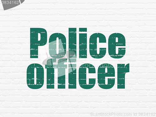 Image of Law concept: Police Officer on wall background
