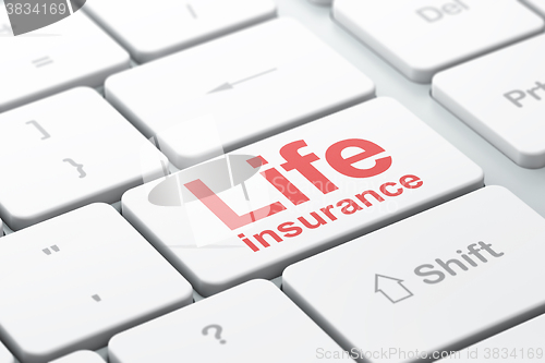 Image of Insurance concept: Life Insurance on computer keyboard background