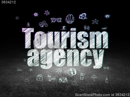 Image of Vacation concept: Tourism Agency in grunge dark room