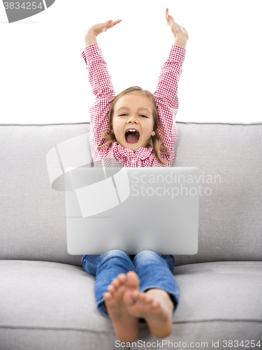 Image of Happy girl with a laptop