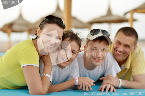 Image of Family at tropical resort.