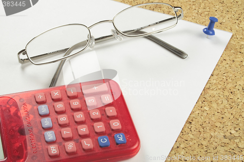 Image of spectacles and calculator