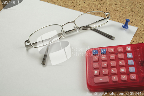 Image of spectacles and calculator