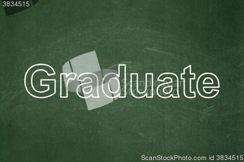 Image of Education concept: Graduate on chalkboard background