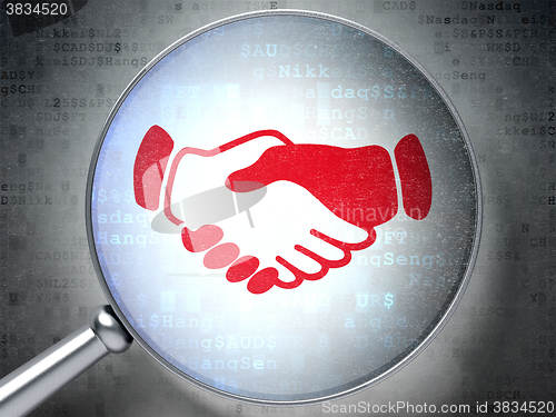 Image of Business concept: Handshake with optical glass on digital background