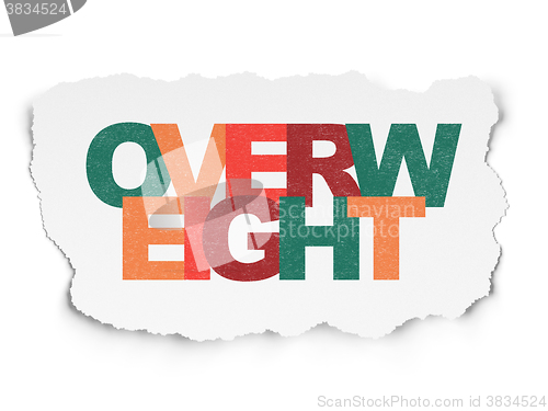 Image of Medicine concept: Overweight on Torn Paper background