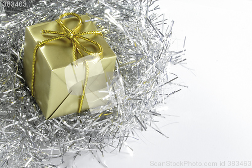 Image of gold present and silver tinsel
