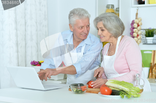 Image of senior man and woman  in the kitchen