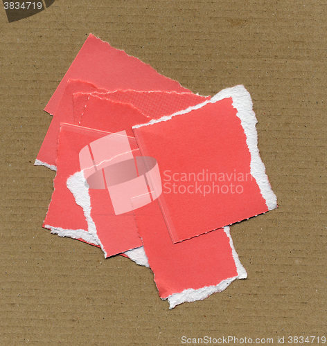 Image of Red Torn paper pieces