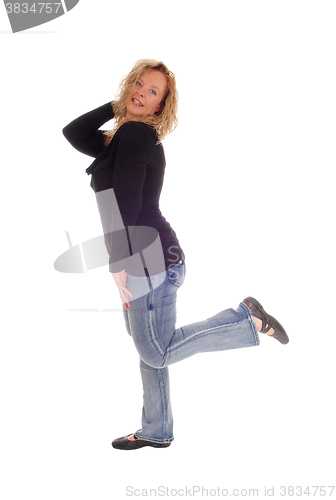 Image of Middle age woman in jeans.