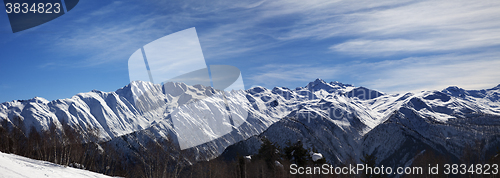 Image of Panoramic view on sunlight snowy mountains in nice morning