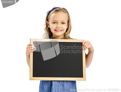 Image of Girl holding a chalkboard