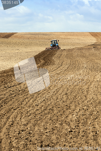 Image of tractor plowing field 