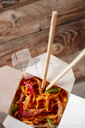 Image of Asian noodles with fresh green onion and boiled egg