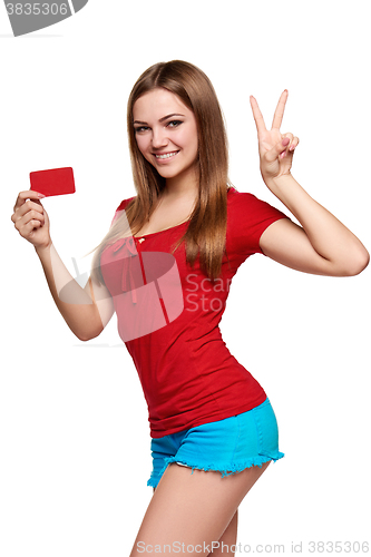 Image of Smiling girl showing red card in hand