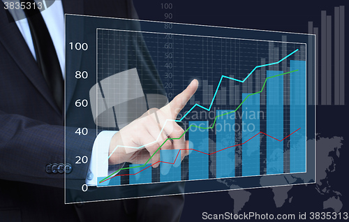 Image of Businessman Touching a Graph Indicating Growth. business concept 
