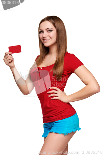 Image of Smiling girl showing red card in hand