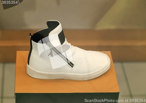 Image of Sports shoes in the shop window