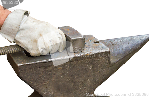 Image of Blacksmith\'s hammer and anvil on a white background.