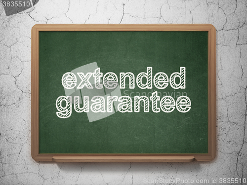 Image of Insurance concept: Extended Guarantee on chalkboard background