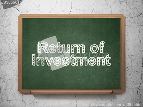 Image of Finance concept: Return of Investment on chalkboard background