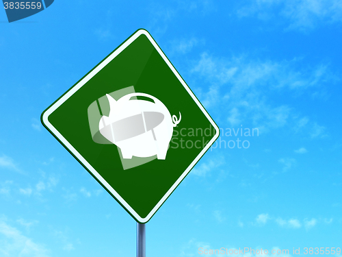 Image of Money concept: Money Box on road sign background