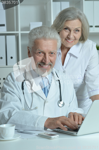 Image of senior Doctors   with laptop