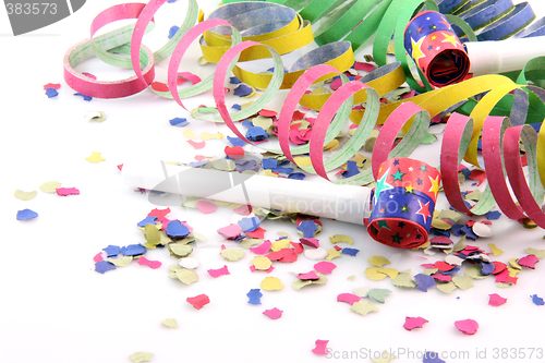 Image of streamers confetti and blowers