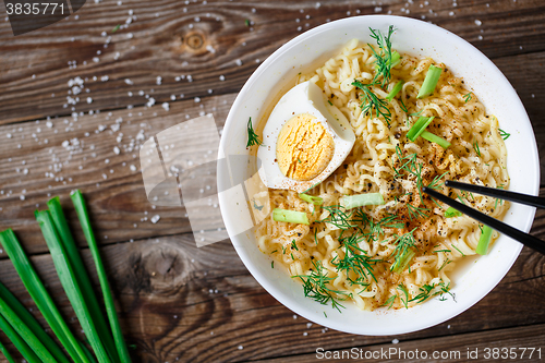 Image of Asian noodles with fresh green onion and boiled egg