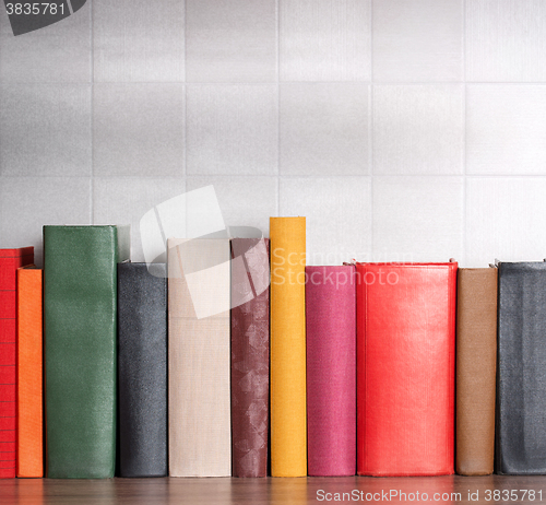 Image of stack of books on the shelf