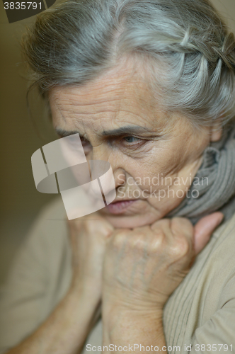 Image of  Sad aged woman