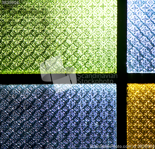 Image of colorated glass and sun in morocco africa window and light